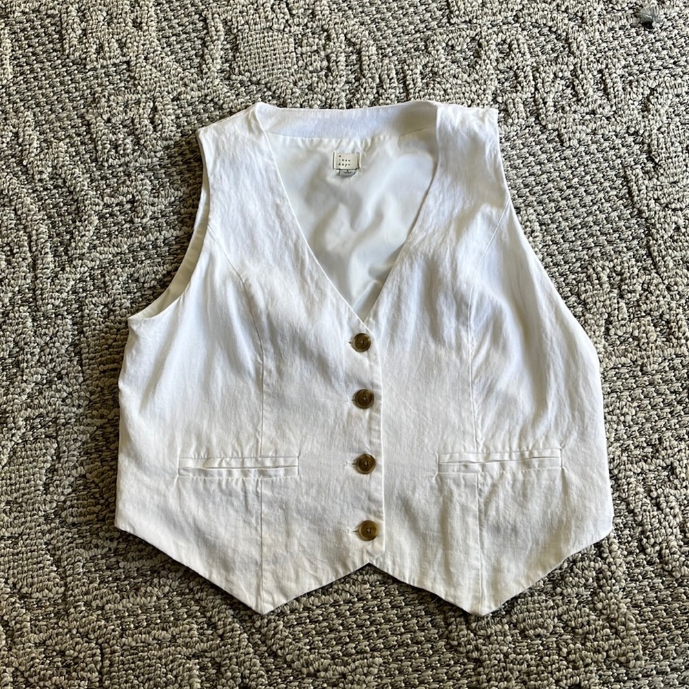 A New Day, white linen vest